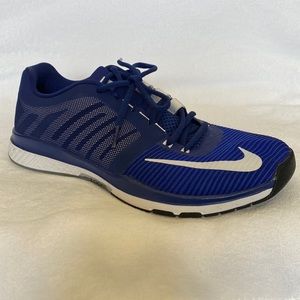 Blue Nike Tennis shoe.